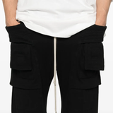 Close up of black pants, showing texture of the cotton fabric