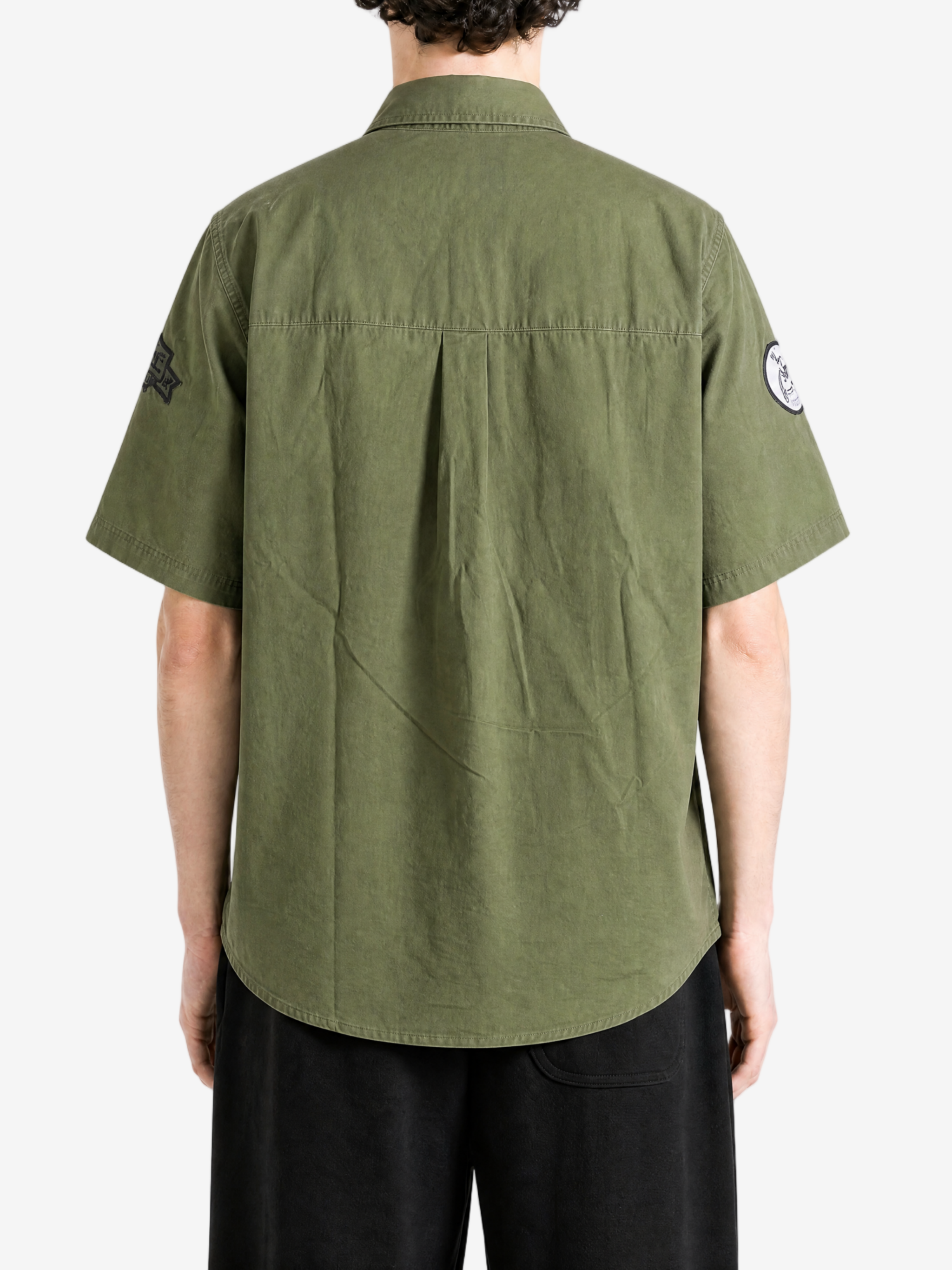 Green shirt, full body view