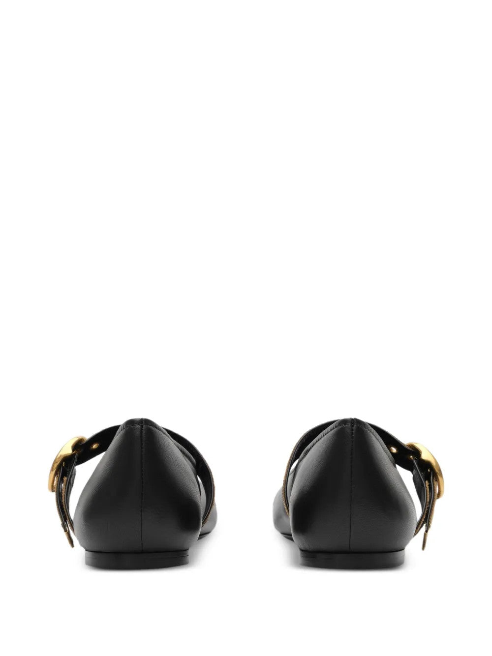 Black flats, back view
