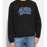 Black hoodies worn by a person, showing the hoodies fit