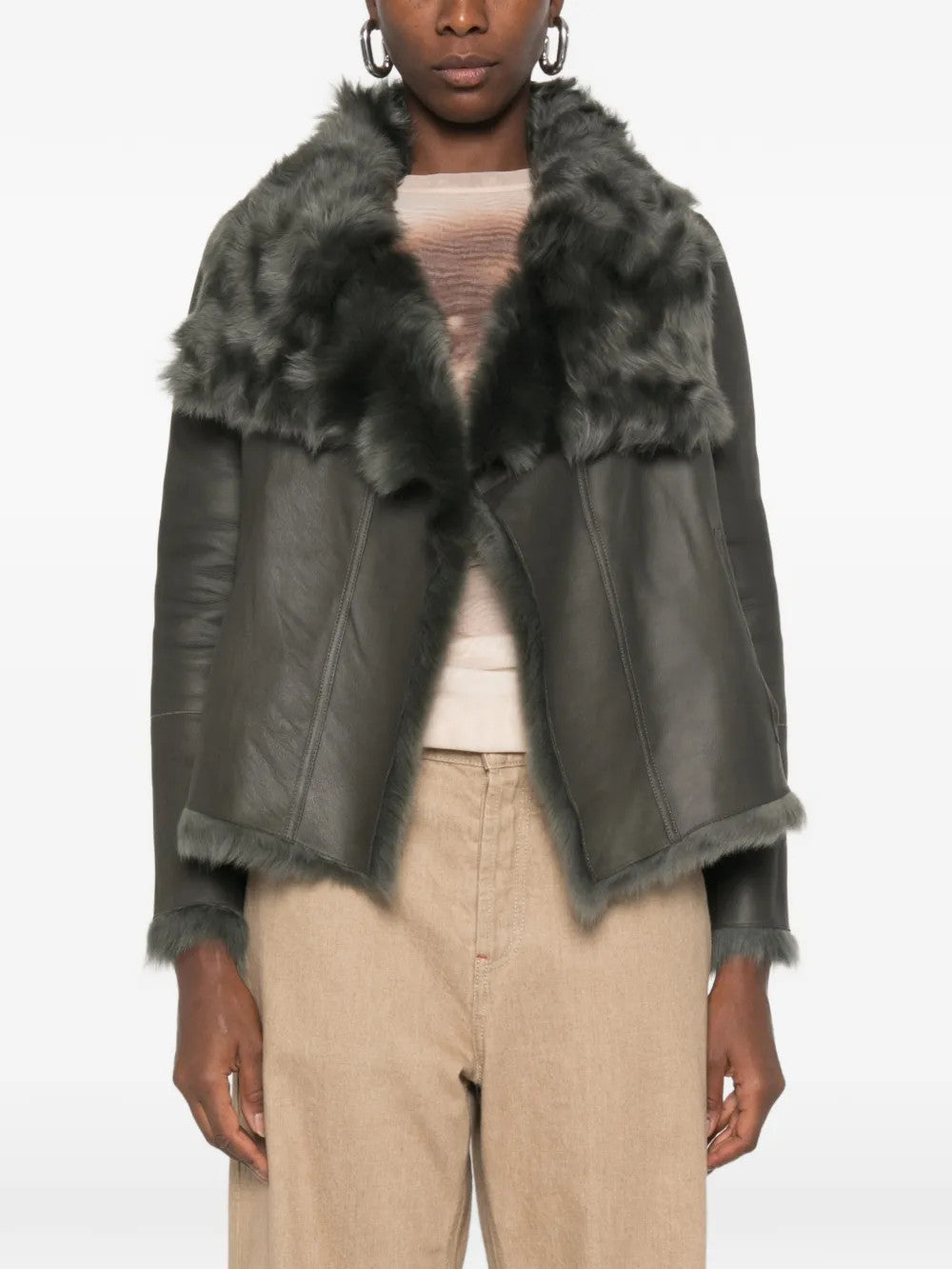 Grey jacket worn by a person, showing the jacket fit
