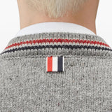 Grey knitwear, front view