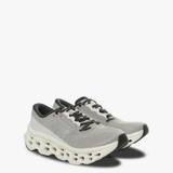 Grey sneakers, side view