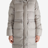 Grey coat worn by a person, showing the coat fit