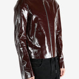 Burgundy jacket worn by a person, showing the jacket's fit