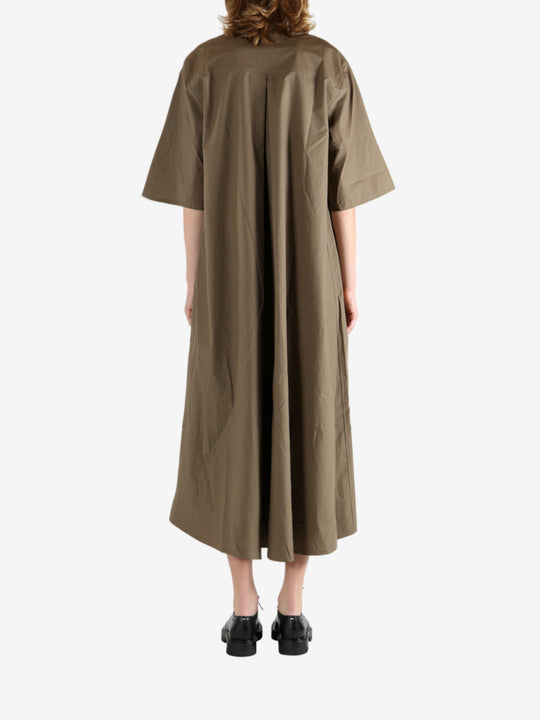 Brown dress worn by a person, showing the dress's fit