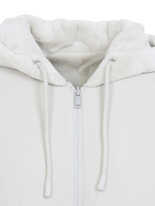 Close up of White jacket, showing texture of the 100% polyester fabric