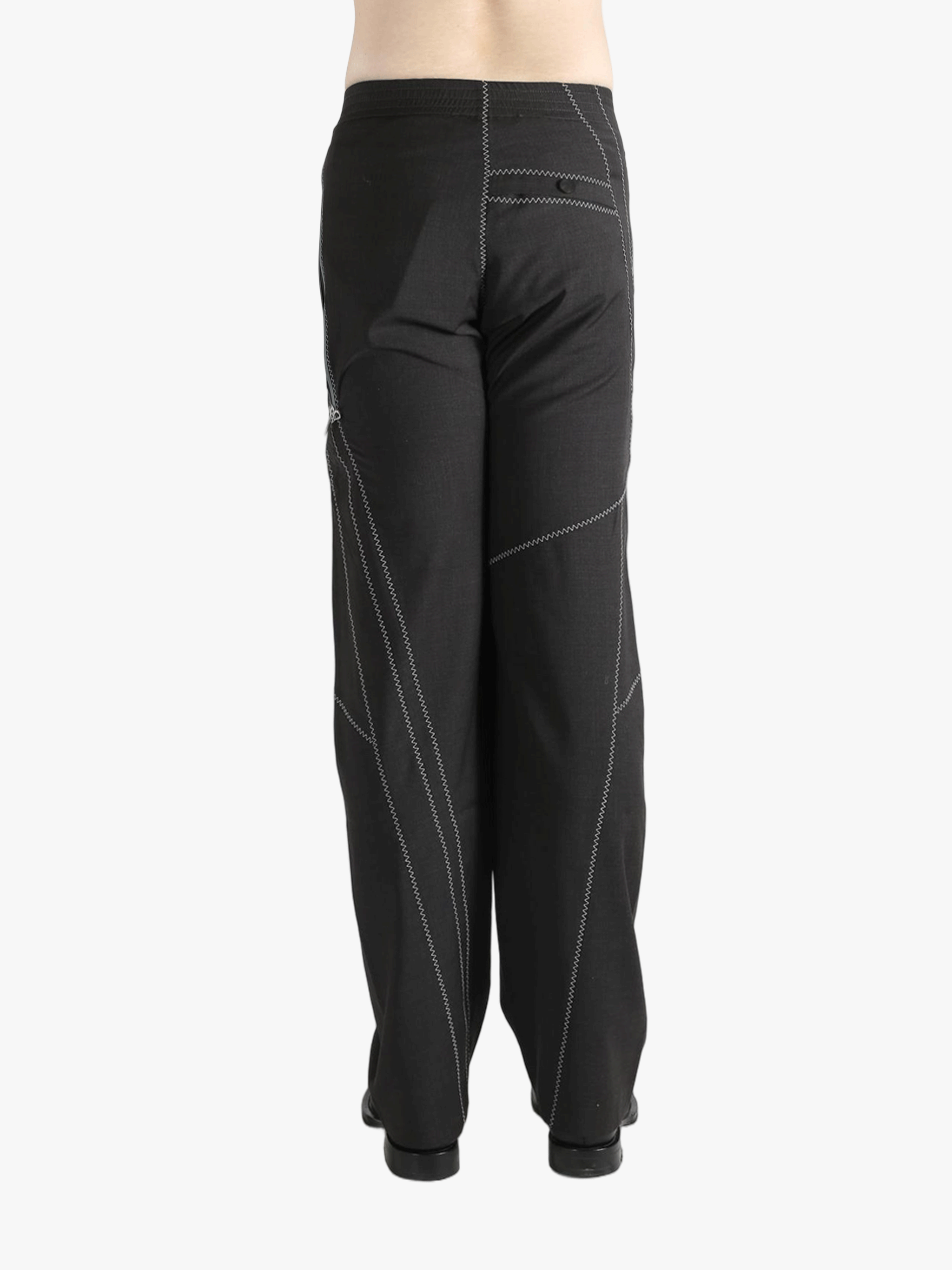 Brown pants worn by a person, showing the pants fit