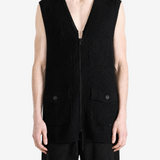 Black jacket worn by a person, showing the jacket fit