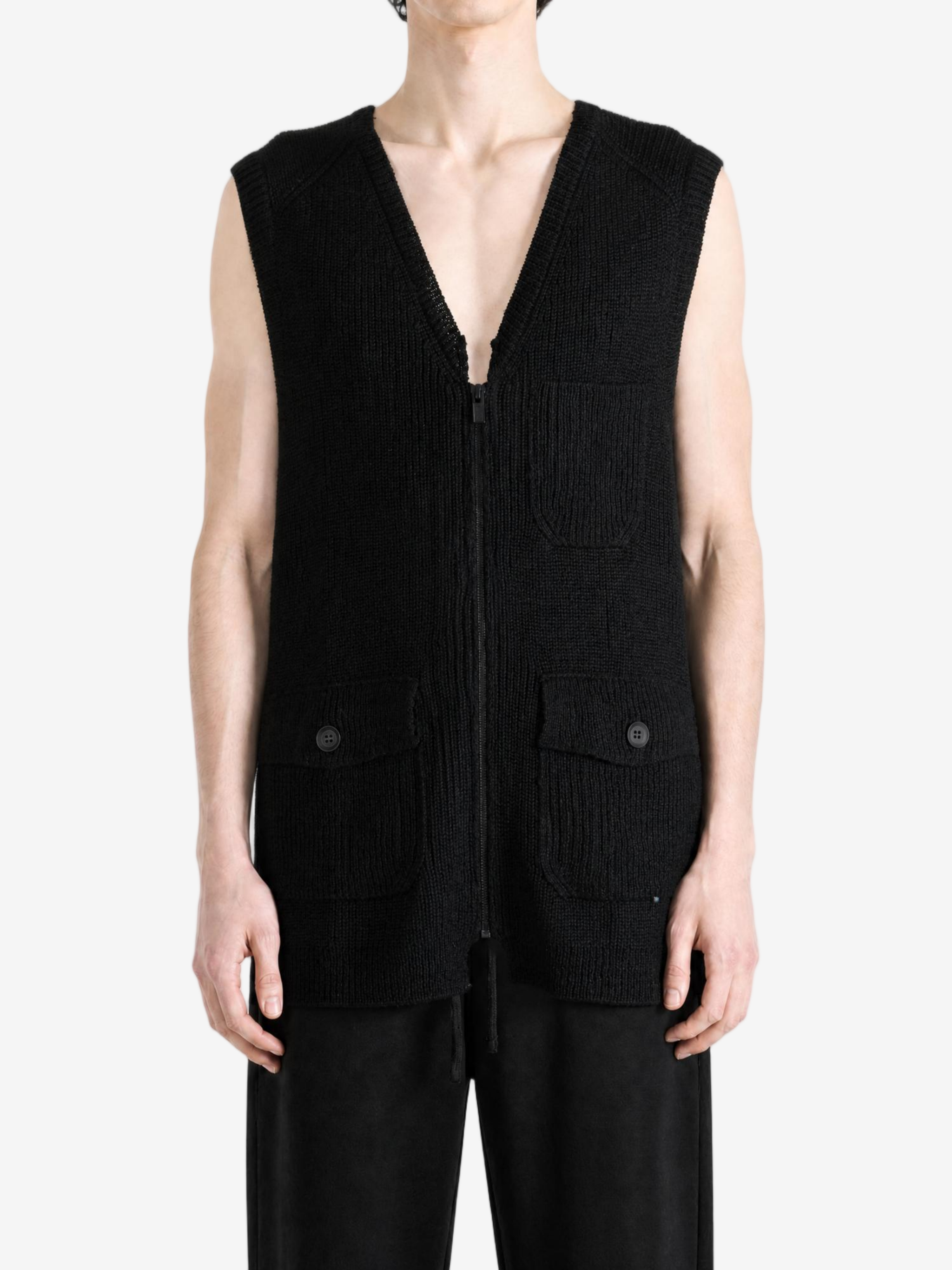 Black jacket worn by a person, showing the jacket fit
