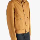Brown jackets worn by a person, showing the jacket's fit 