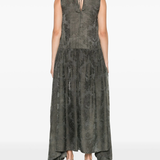 Green dress  worn by a person, showing the dress's fit