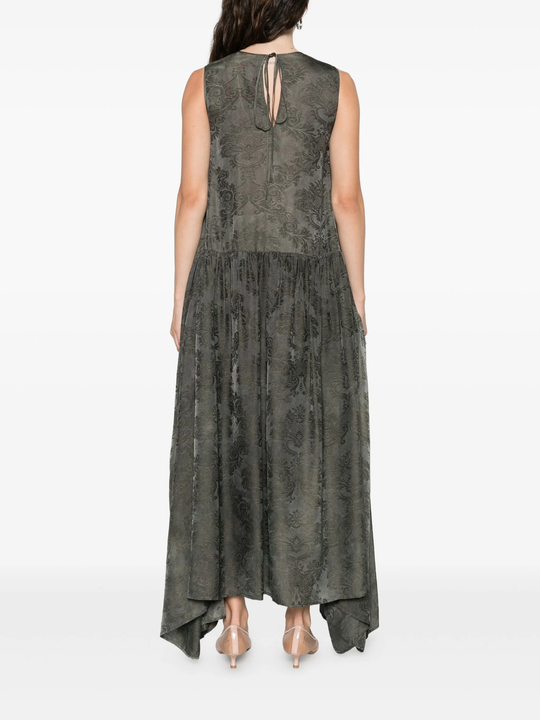 Green dress  worn by a person, showing the dress's fit