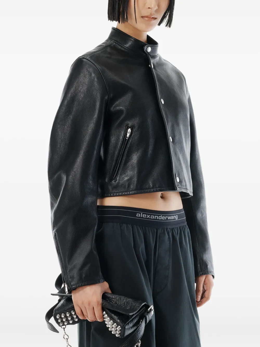 Close up of black pants,showing texture of the cotton fabric.