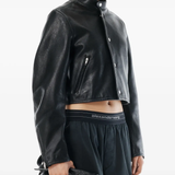 Close up of black pants,showing texture of the cotton fabric.