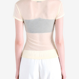 Tan top worn by a person, showing the top fit
