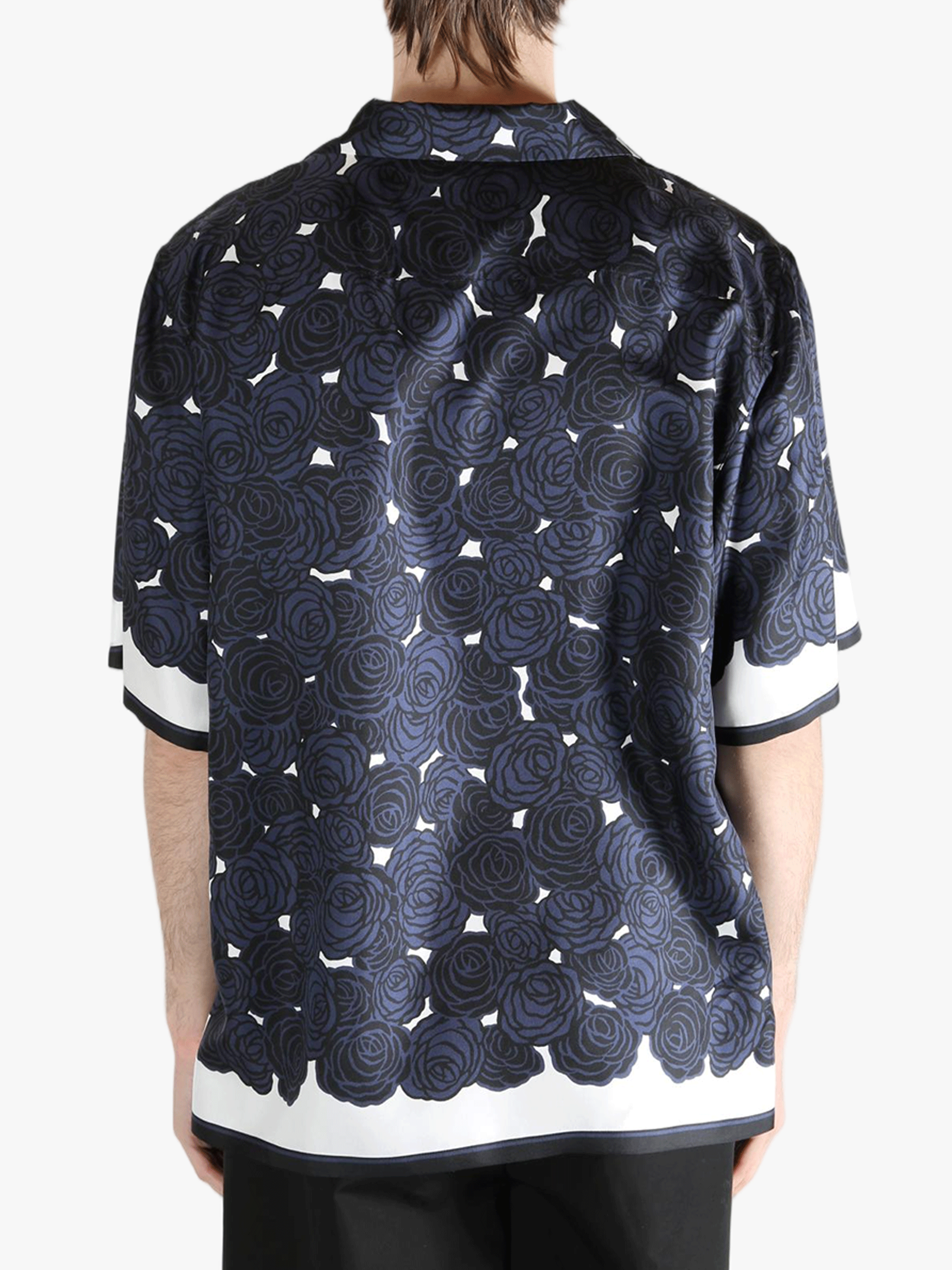 Blue shirt worn by a person, showing the shirt's fit