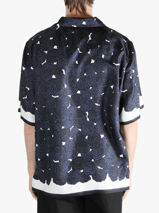 Blue shirt worn by a person, showing the shirt's fit