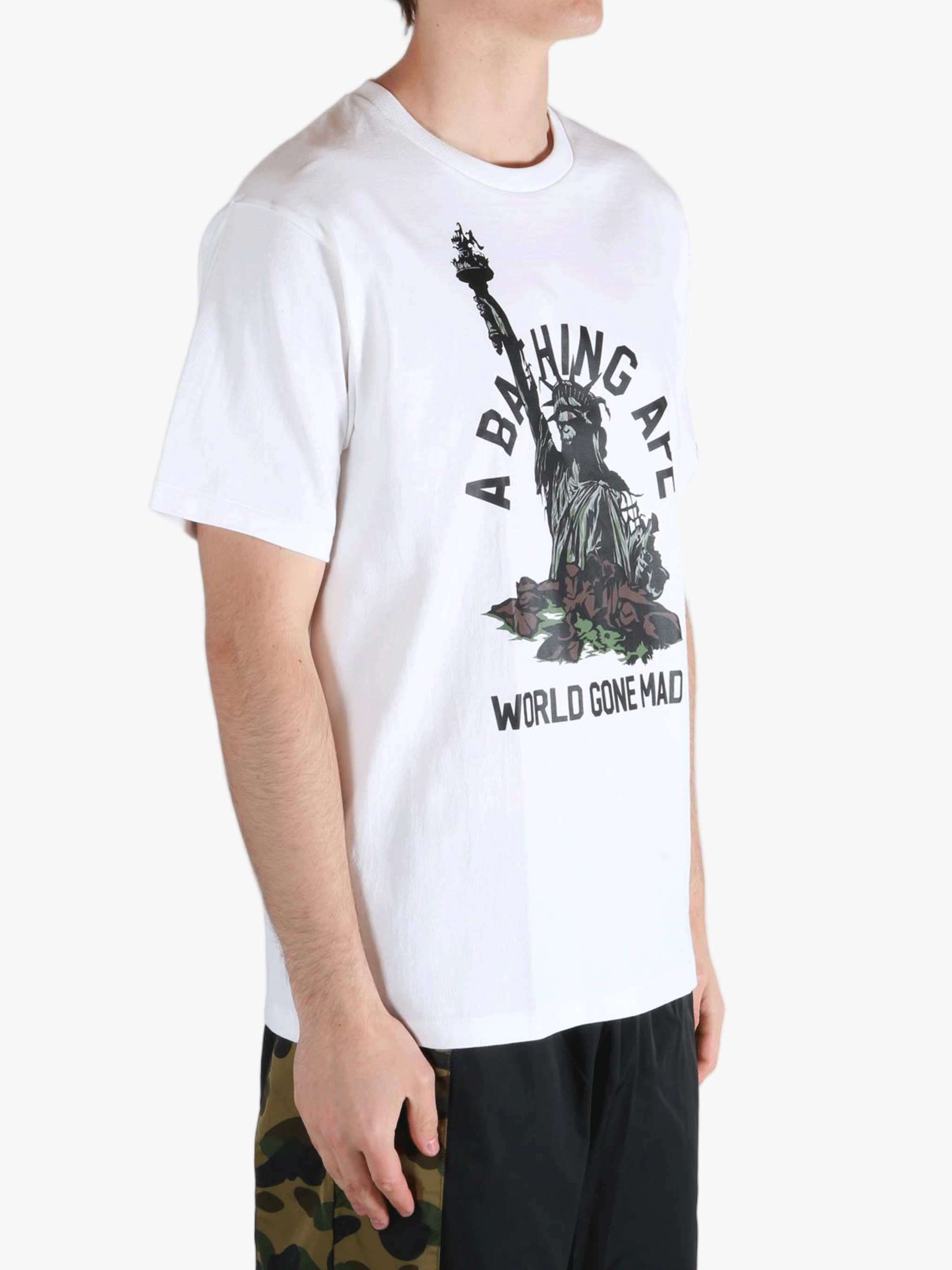 White T-shirt worn by a person, showing the t-shirt's fit