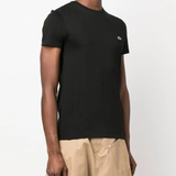 Black t-shirt worn by a person, showing the t-shirt's fit