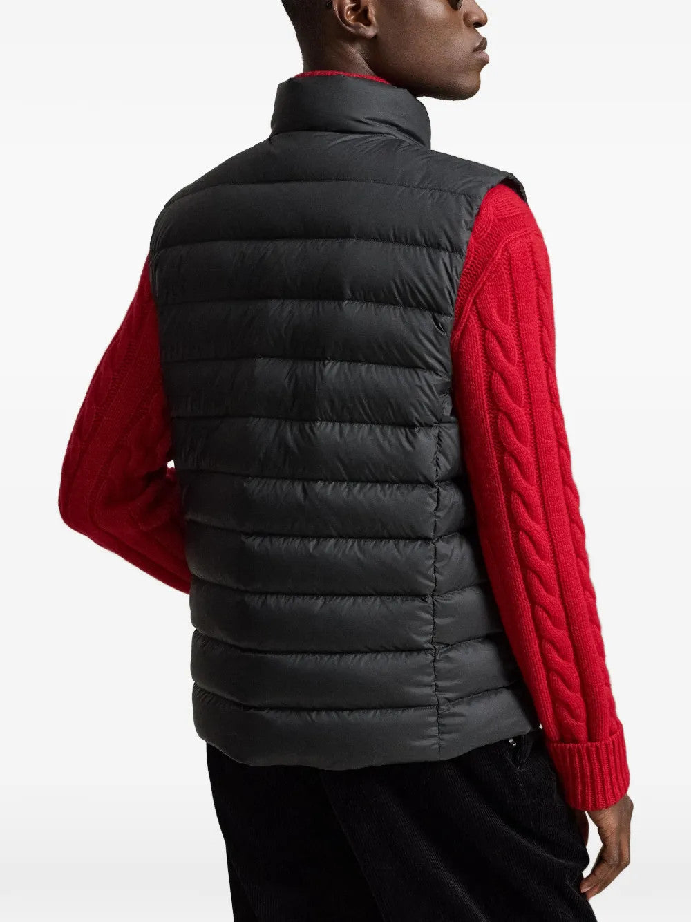 Black jacket worn by a person, showing the jacket fit