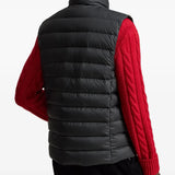 Black jacket worn by a person, showing the jacket fit