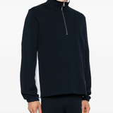 Navy pullover worn by a person, showing the pullover fit