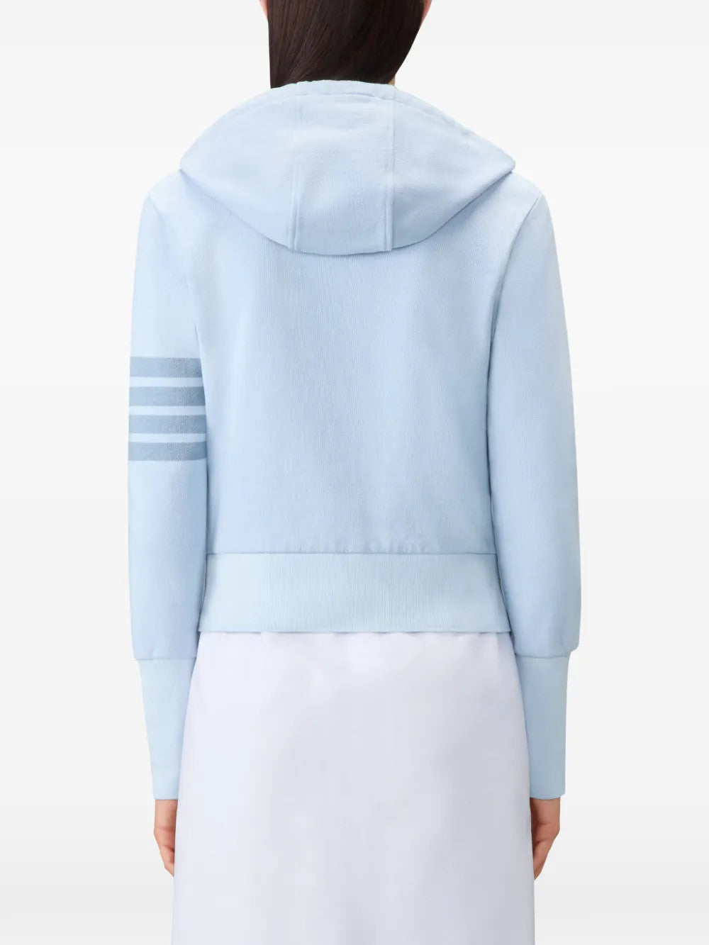 Blue hoodie worn by a person, showing the hoodie fit