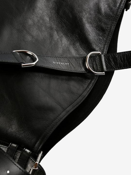 Close up of black bag, showing texture of the leather fabric