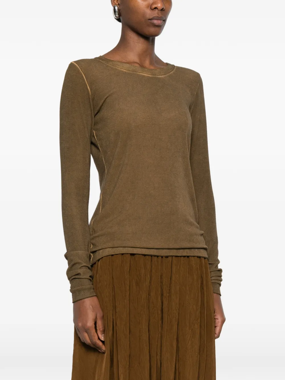 Brown tops worn by a person, showing the tops fit