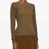 Brown tops worn by a person, showing the tops fit