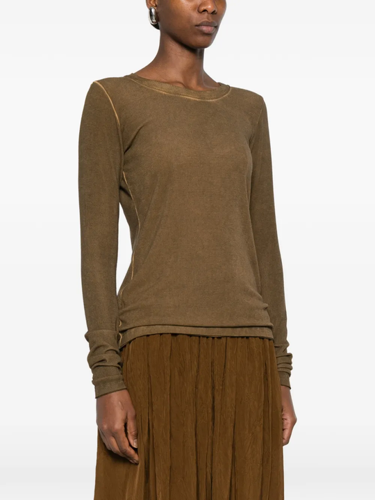 Brown tops worn by a person, showing the tops fit