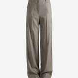 Brown pants worn by a person, showing the pant's ift