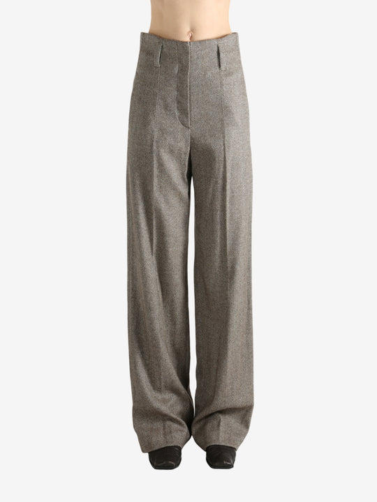 Brown pants worn by a person, showing the pant's ift