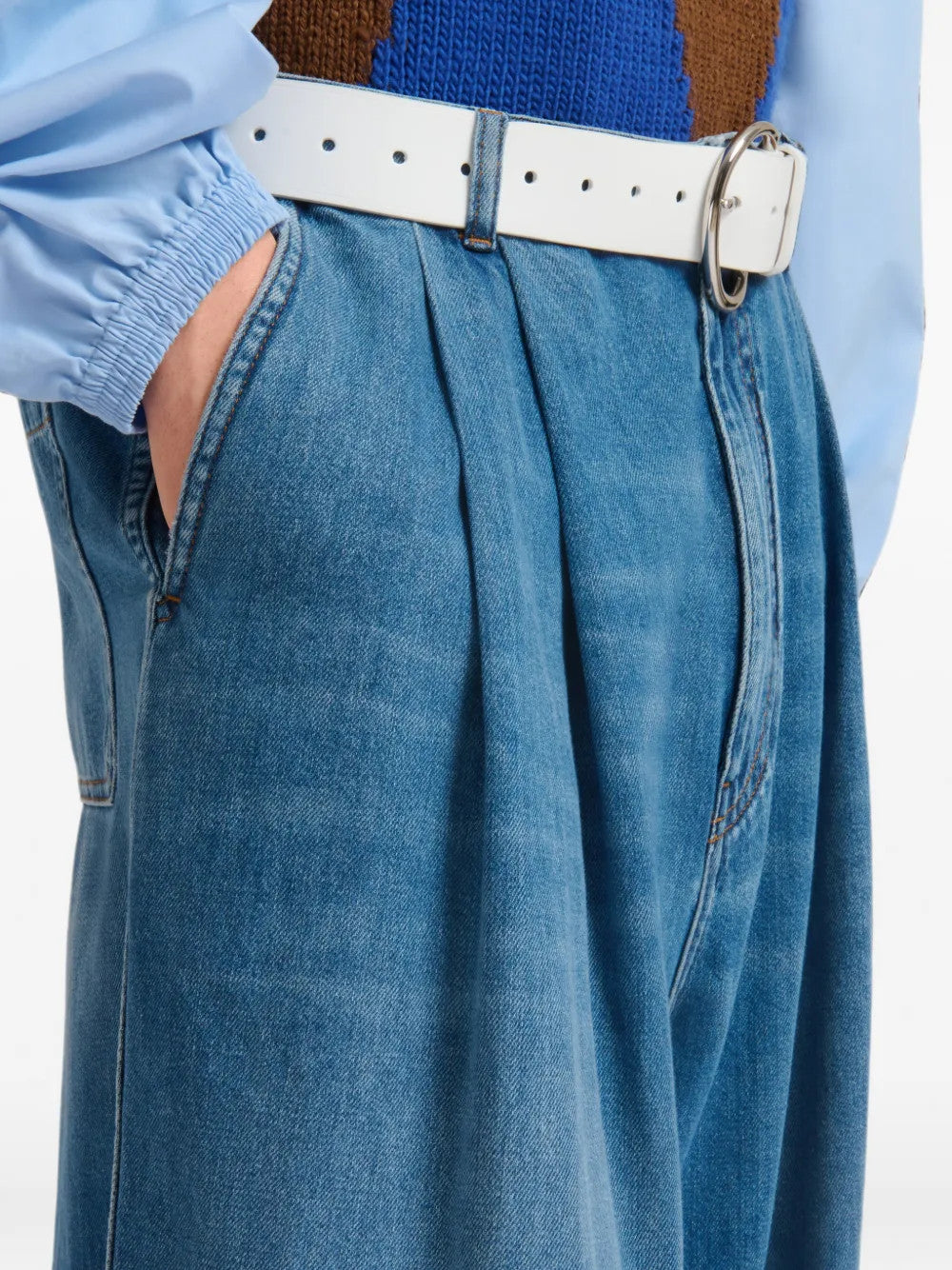 Blue pants worn by a person, showing the pants fit