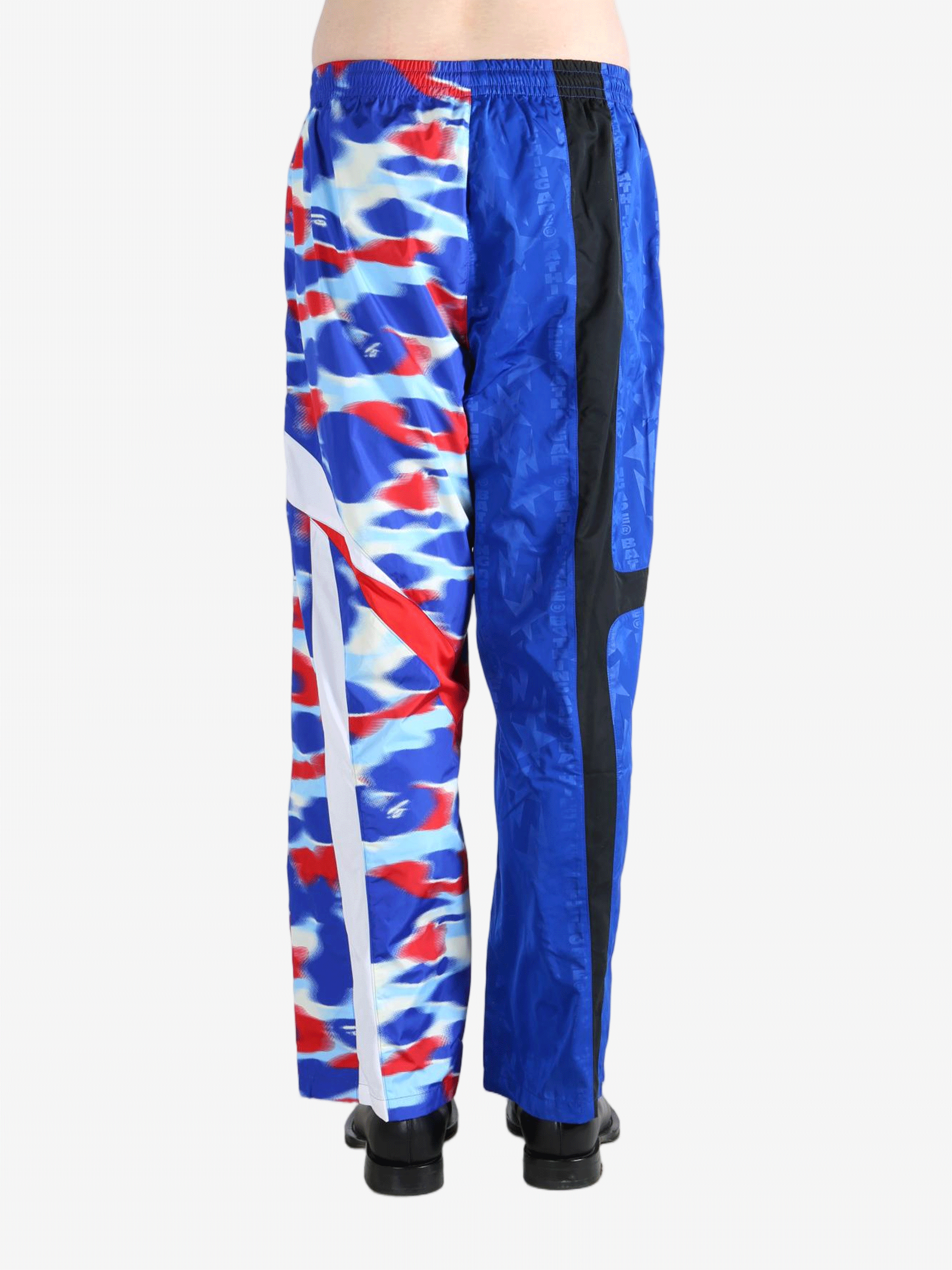 Blue pants worn by a person, showing the pants fit