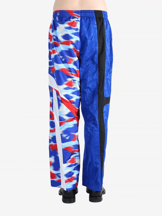 Blue pants worn by a person, showing the pants fit