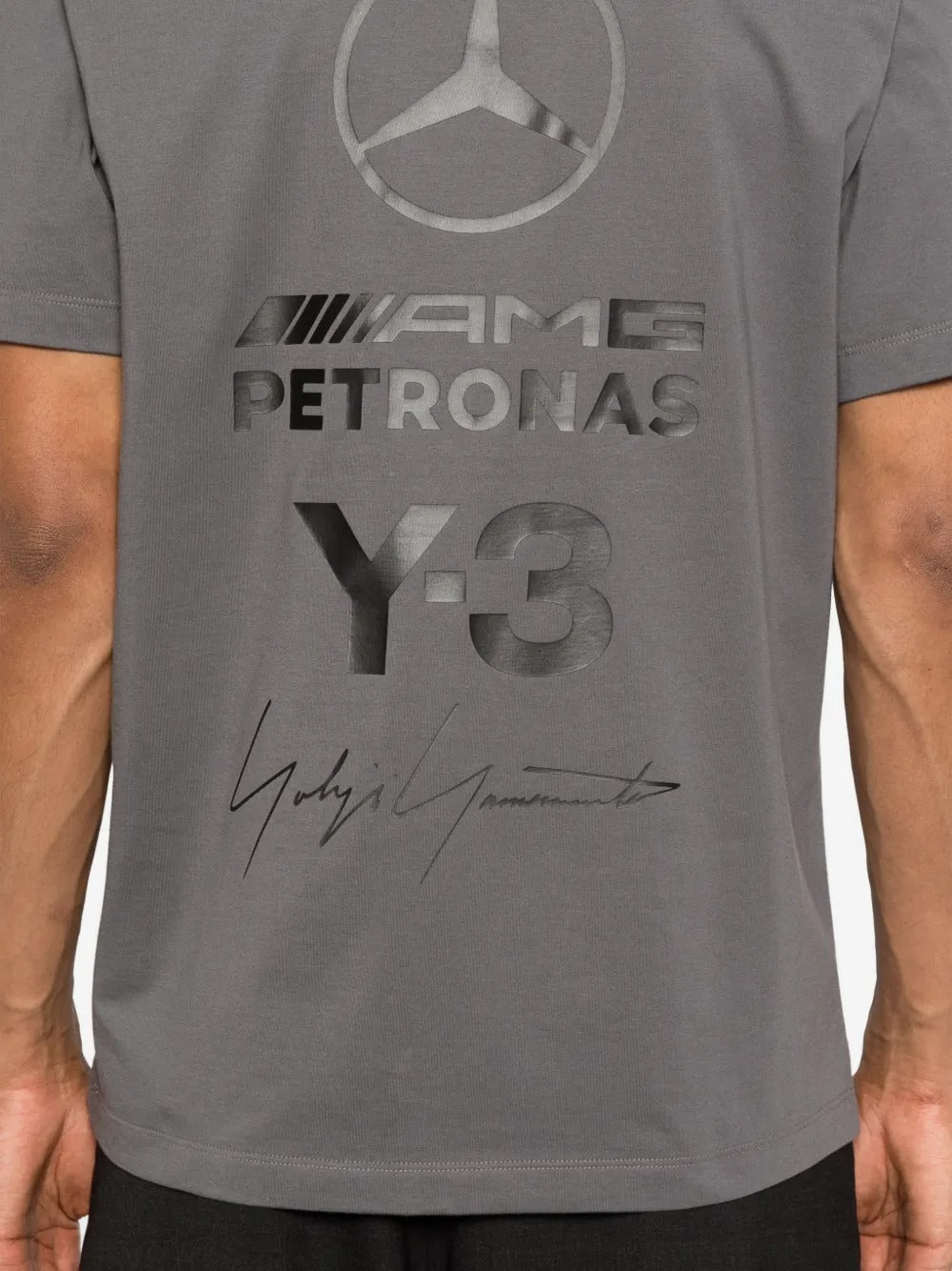 Close up of the grey t-shirt, showing texture of the cotton fabric