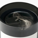 Close up of candle, showing texture of the limonene ingredients