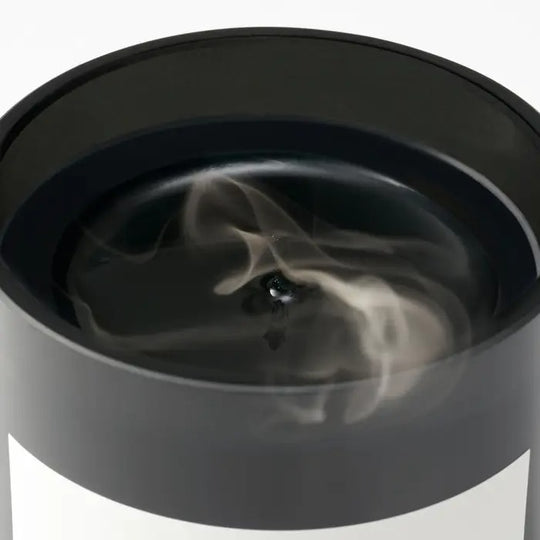 Close up of candle, showing texture of the limonene ingredients