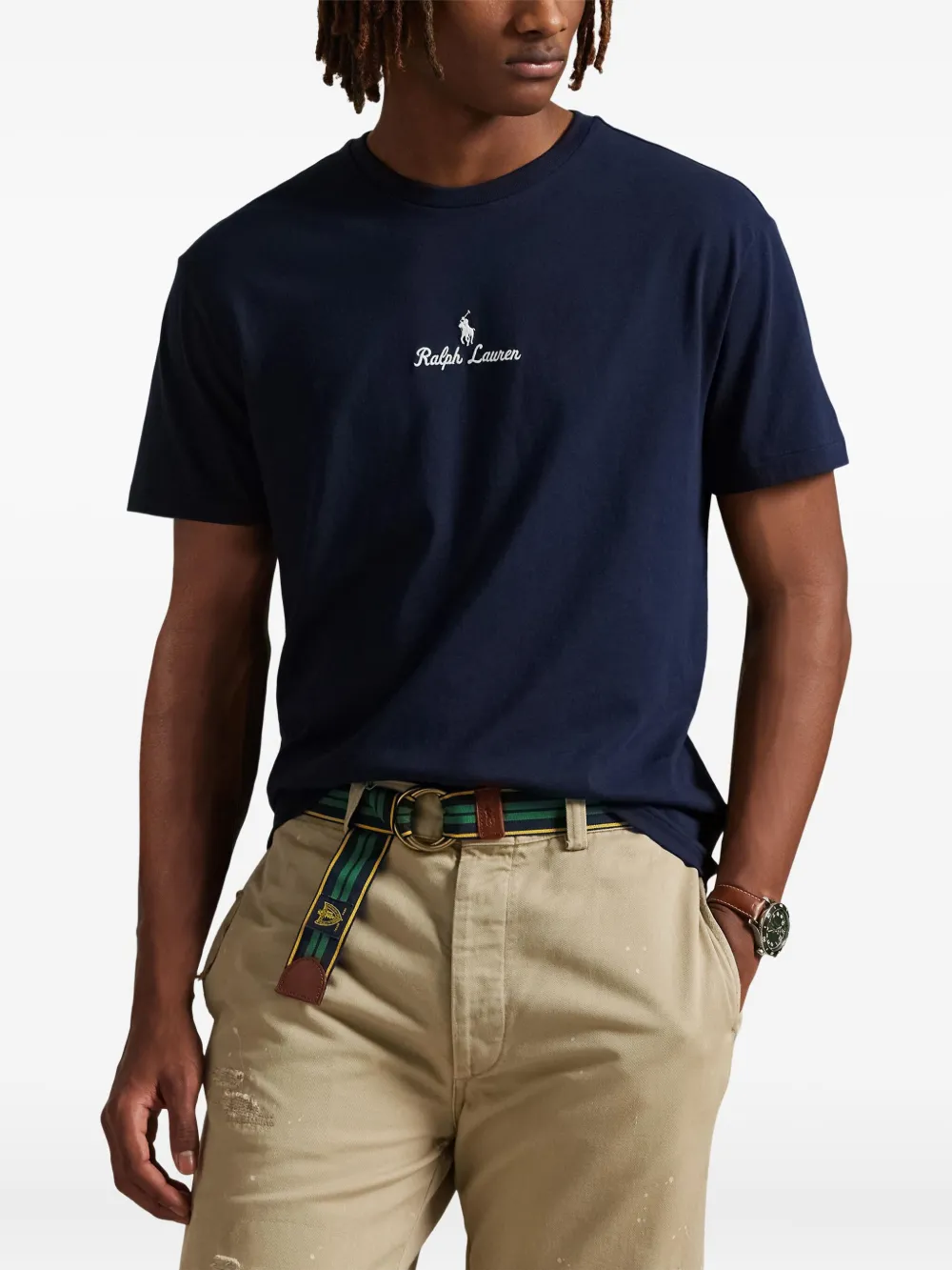 Blue t-shirts worn by a person, showing the t-shirts fit