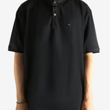 Black T-shirt worn by a person, showing the T-shirt's fit