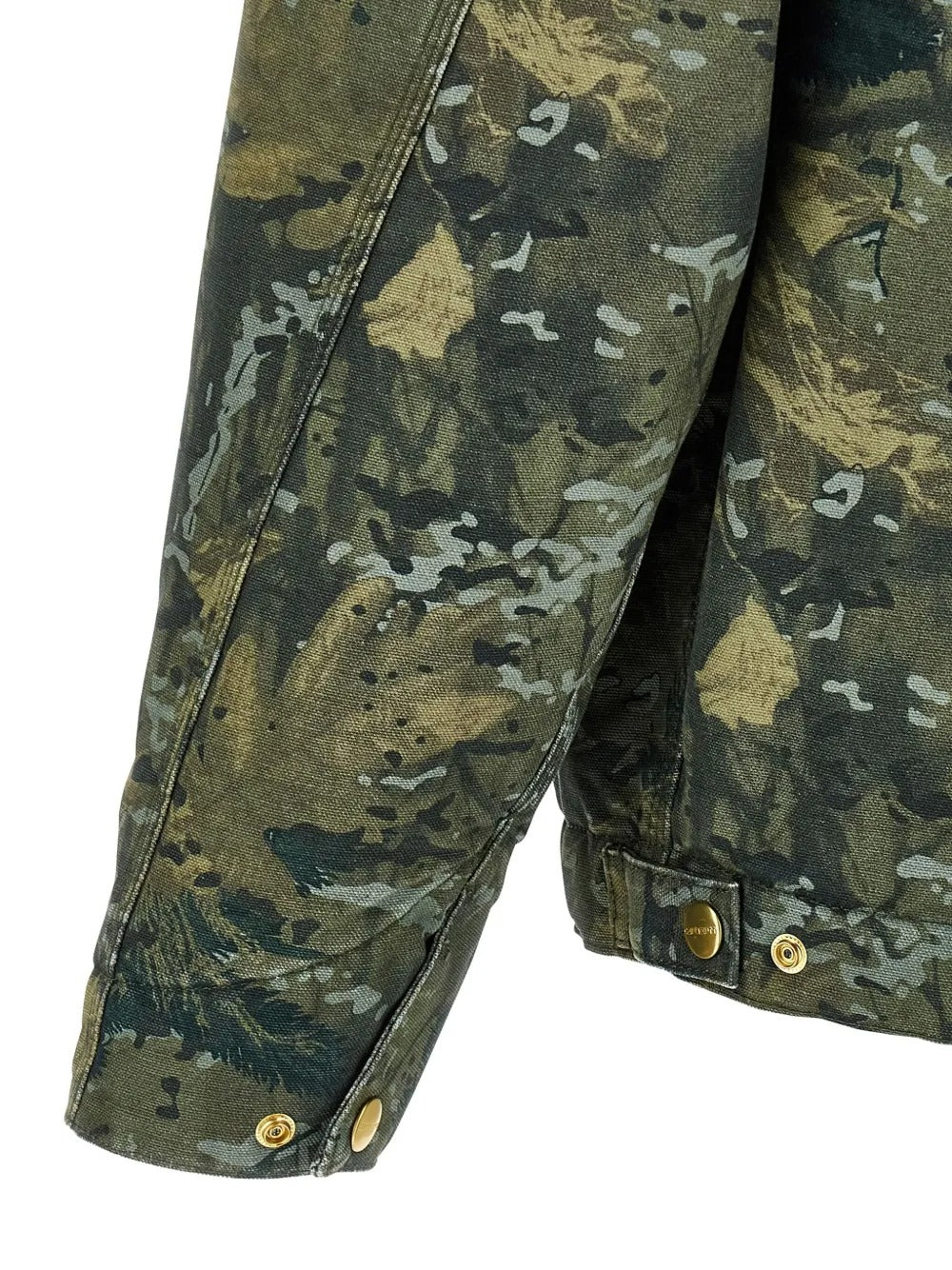 Close up of the green jacket, showing texture of the cotton fabric