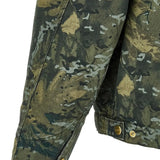 Close up of the green jacket, showing texture of the cotton fabric