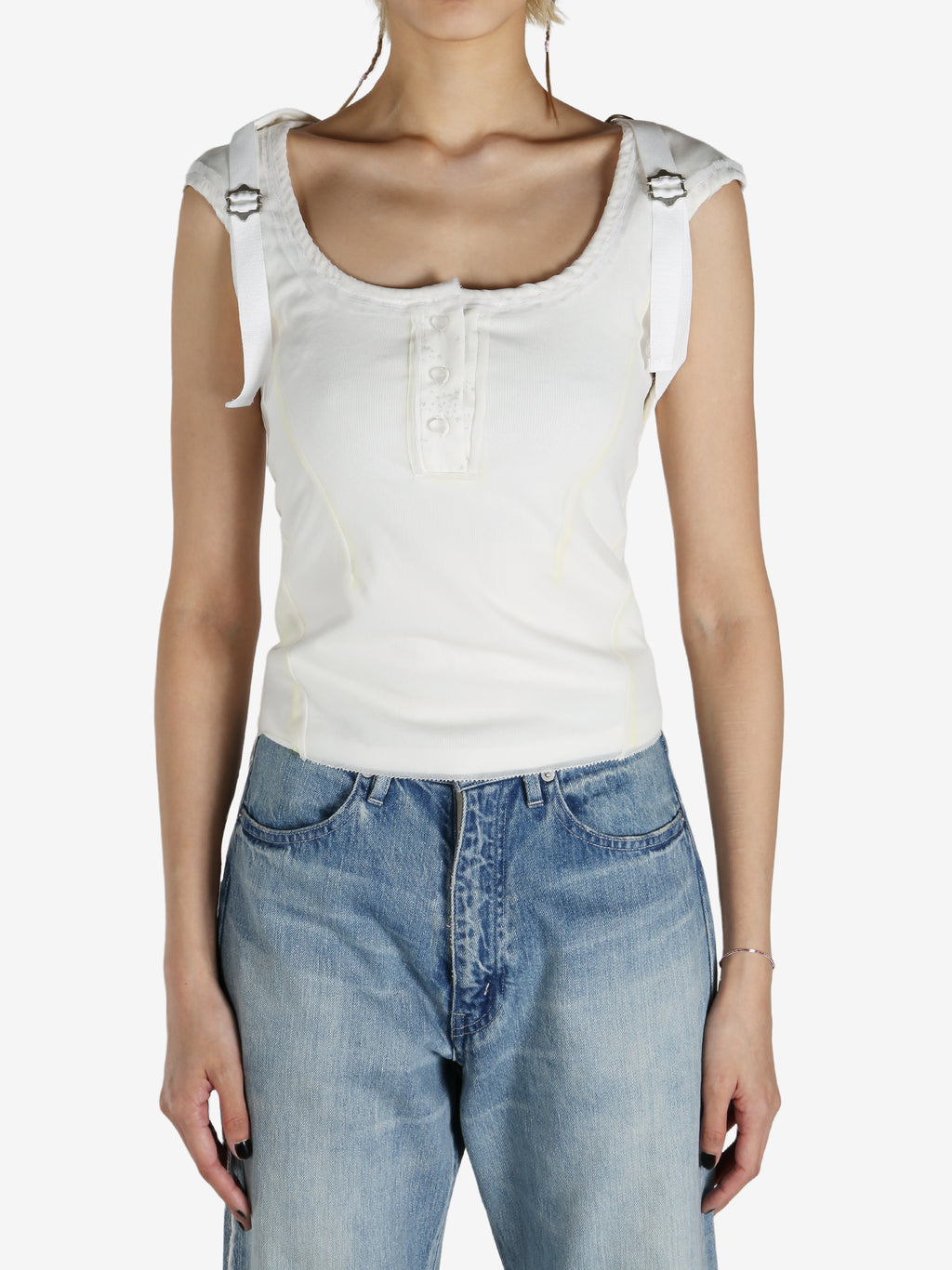 White shirt worn by a person, showing the shirt‘s fit