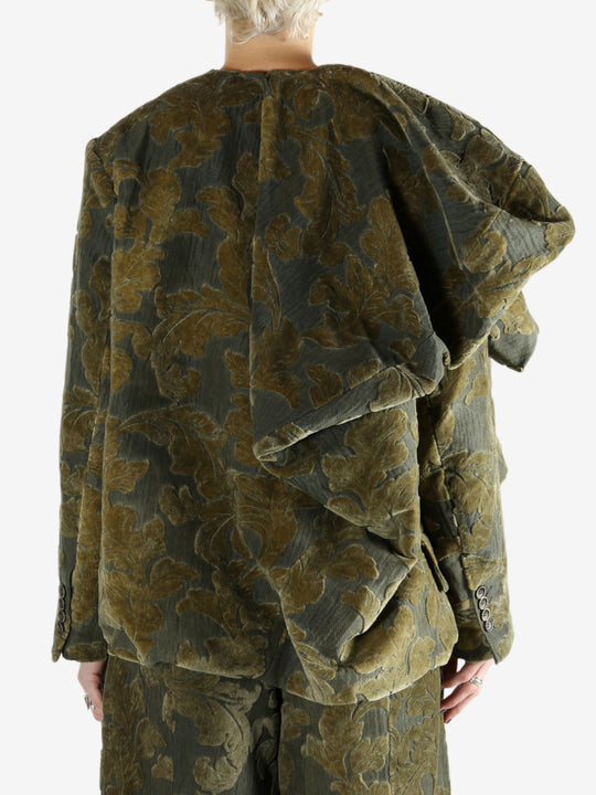 Grey jacket worn by a person, showing the jacket's fit