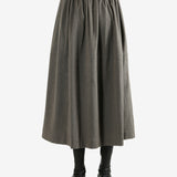 Grey skirt worn by a person, showing the skirt fit