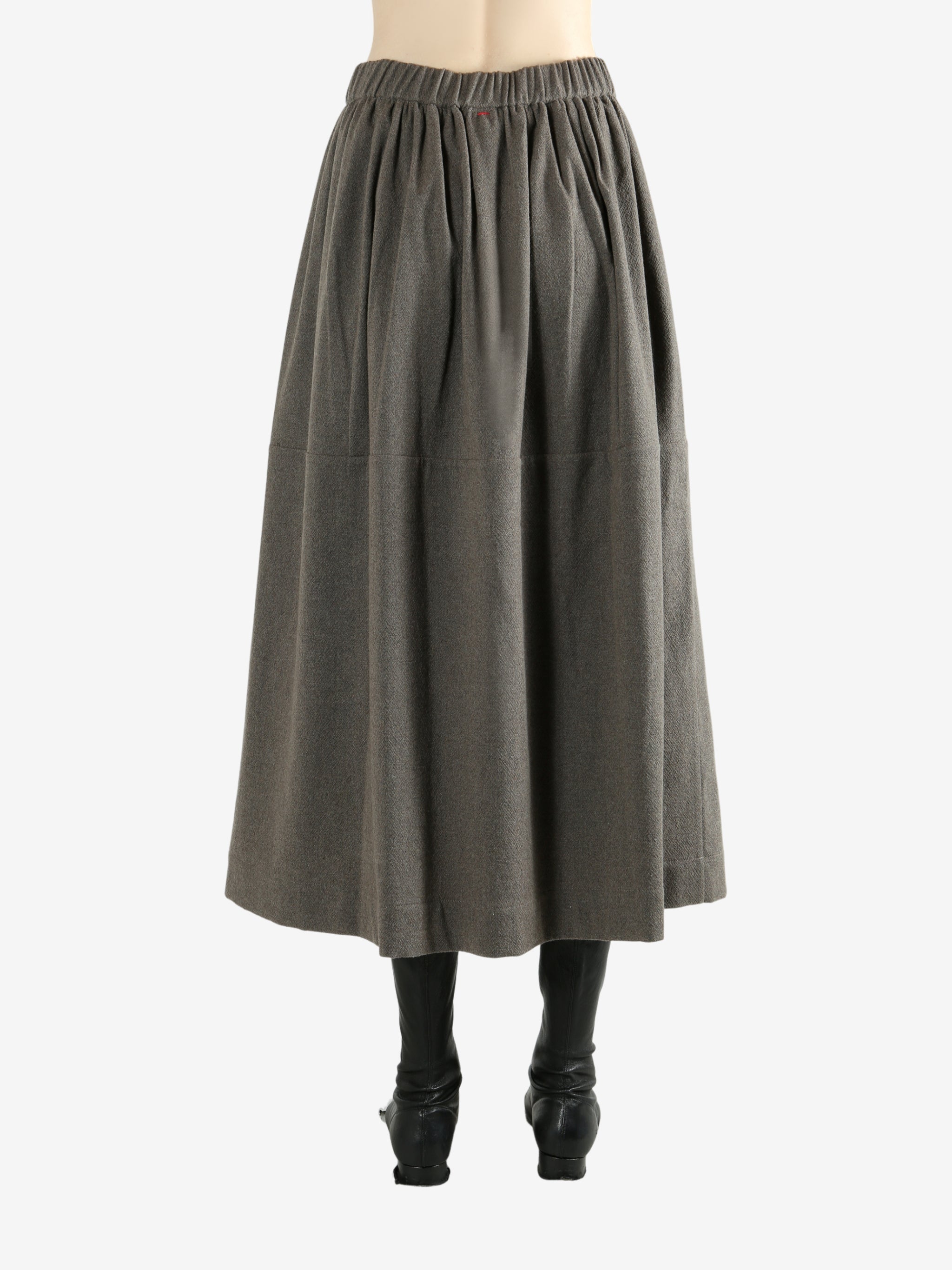 Grey skirt worn by a person, showing the skirt fit
