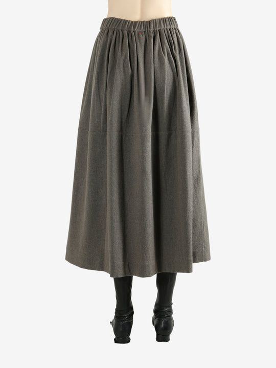 Grey skirt worn by a person, showing the skirt fit