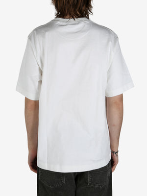 White shirt worn by a person, showing the shirt's fit